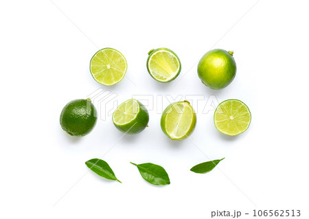 Limes with leaves isolated on white background. Limes with leaves isolated on white background. 106562513