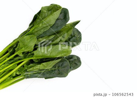 Fresh spinach on white background Fresh spinach on white background 106562543