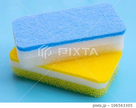 Cleaning kitchen dishwashing sponge. Copy space 106563305