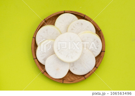 Sliced Japanese daikon. Fresh vegetables Sliced Japanese daikon. Fresh vegetables 106563496