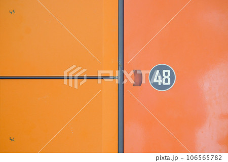 orange color storage box in public place. safe storage locker for shopping malls 106565782