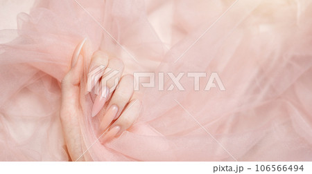 Elegant pastel pink natural manicure. Elegant pastel pink natural manicure. 106566494