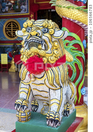 This brightly colored stone lion represents the Chinese and East Asian belief that bright colors symbolize prosperity and good luck. The bright colors of this stone lion will help attract good luck. This brightly colored stone lion represents the Chinese and East Asian belief that bright colors symbolize prosperity and good luck. The bright colors of this stone lion will help attract good luck. 106566783