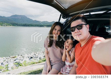 Summer break Happy family having fun while taking a selfie camera. The concept of family on vacation and travel. 106568374