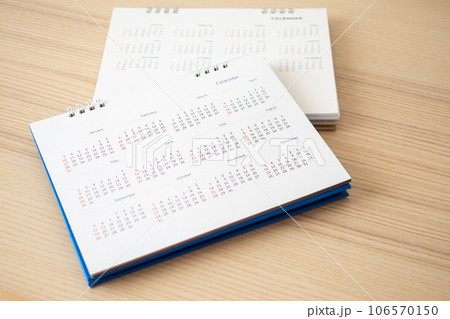 Calendar page close up on wood table background business planning appointment meeting concept 106570150