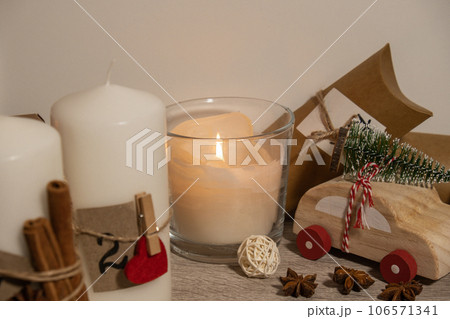 Original Advent Calendar for Christmas Homemade. Candle burning evening night time Preparation to Christmas concept. Family winter holidays. Eco friendly presents gifts. open the package every day 106571341