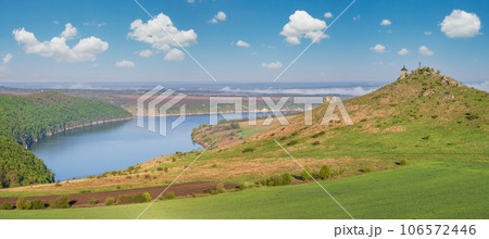 Ukraine without russian aggression. Amazing spring view on the Dnister River Canyon with picturesque rocks, fields, flowers. This place named Shyshkovi Gorby,  Nahoriany, Chernivtsi region, Ukraine. 106572446