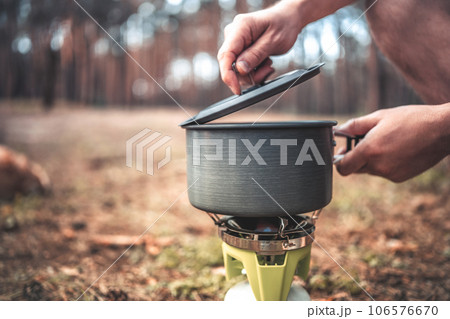 Cooking in the camping in the wood 106576670