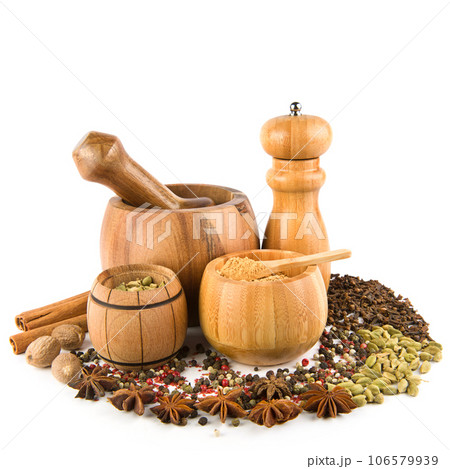 Wooden pestle, mortar, chopper and spice set isolated on white background. Wooden pestle, mortar, chopper and spice set isolated on white background. 106579939