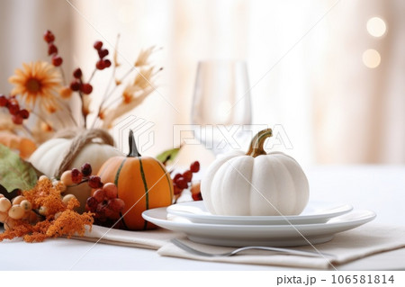 Festive autumn table setting for Thanksgiving with decorations made of natural plants 106581814