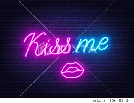 Kiss Me neon sign on brick wall background. 106583380