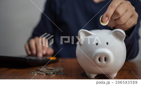 Man hand holding piggy bank. Business financial and banking investment ,saving money concept. 106583589