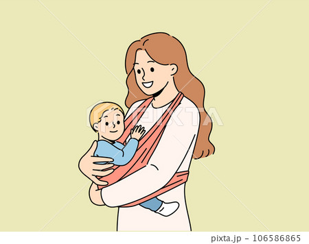 Mother holds baby in carrier sling and smiles, taking care of son and using comfortable babywearing. 106586865