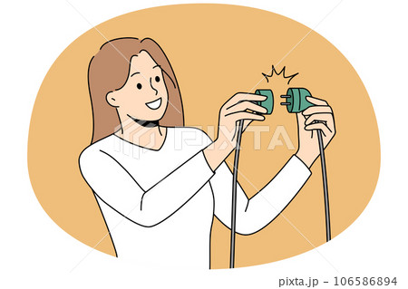 Woman put plug in electric pocket Woman put plug in electric pocket 106586894