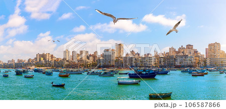 Alexandria harbour with azure waters and boats, beautiful seaside view, Egypt 106587866