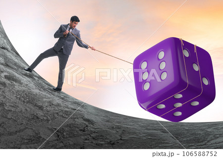 Uncertainty concept with businessman and dice 106588752