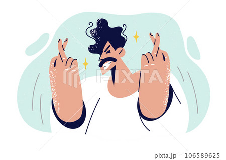 Man crosses fingers after making wish and looks forward to realization of cherished dream 106589625