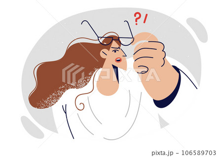 Confused woman puts on glasses to see small detail, due to vision problems and need for eye surgery 106589703