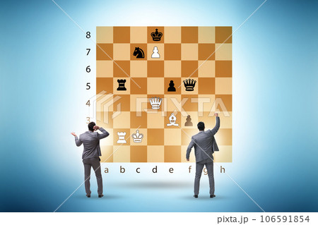 Business people playing chess on the board 106591854