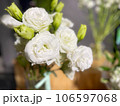white wedding bouquet with white roses 106597068