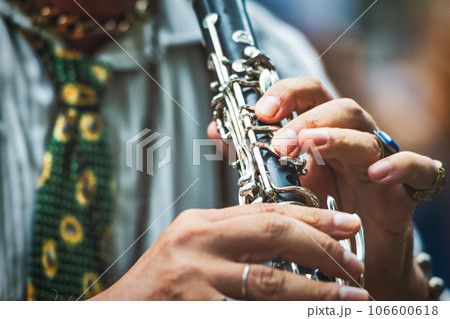Detail of a clarinetist Detail of a clarinetist 106600618
