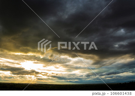 colorful dramatic sky with cloud at sunset. 106601438