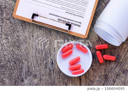 Closeup of medical capsule or pill or drug Closeup of medical capsule or pill or drug 106604095