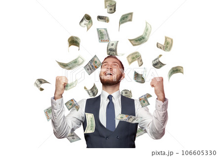Happy successful man standing under money rain isolated on white background 106605330