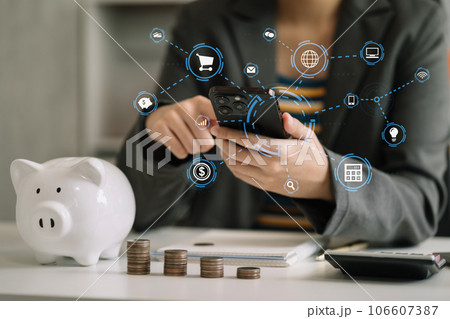 Business woman hand holding coins to stack on desk concept saving money finance and accounting. Business woman hand holding coins to stack on desk concept saving money finance and accounting. 106607387