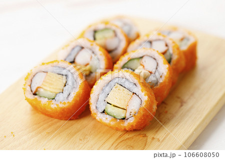 sushi rolls with crab, Japanese omelette and cucumber on a plate. 106608050