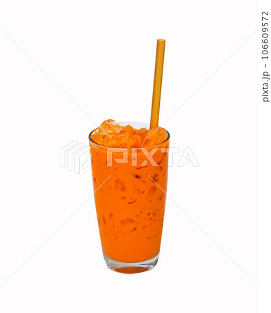 Iced milk tea color orange with crushed ice in glass on tall with straw brown fragrant sweet. isolated on white background. Old-fashioned tea, popular in Thailand around world. 106609572