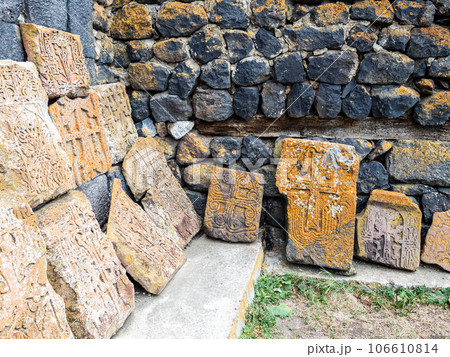 Khachkars along walls of shurch in Sevanavank Khachkars along walls of shurch in Sevanavank 106610814
