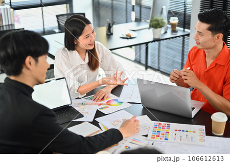 Male and female creative designer brainstorming for new interior design renovation projects at office 106612613
