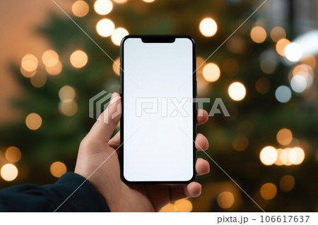 Smartphone mock up on Christmas street background Smartphone mock up on Christmas street background 106617637