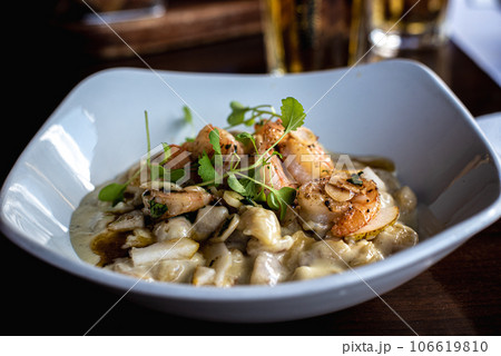 gnocchi with shrimp and pear gnocchi with shrimp and pear 106619810