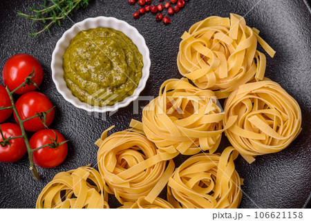 Delicious fresh pasta consisting pesto sauce with salt, spices and herbs 106621158