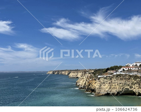 View of Carvoeiro fishing village with beautiful beach, Algarve 106624736