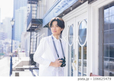 カメラと男性 106625479