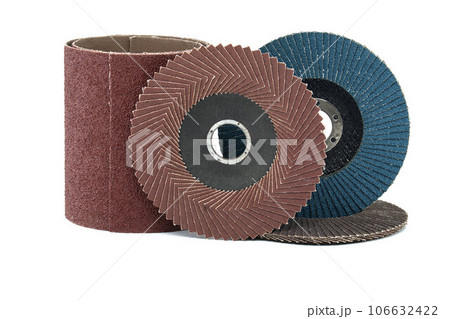 Abrasive sanding discs and sandpaper over white Abrasive sanding discs and sandpaper over white 106632422