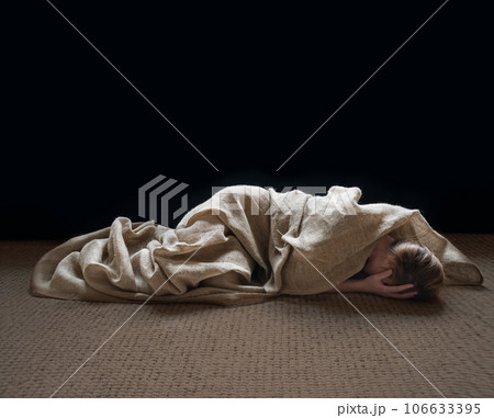 Sad girl lying on the floor Sad girl lying on the floor 106633395