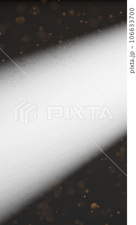白背景と金色の紙吹雪。スポットライト。（縦長） 106633700