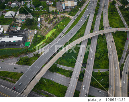 Aerial view city transport junction cross road with green public park transport Aerial view city transport junction cross road with green public park transport 106634183