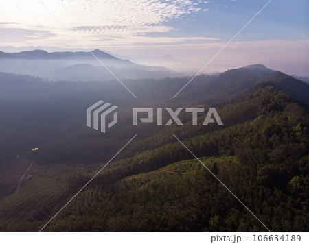 Aerial view mountain sunrise with fog sunrise light morning Aerial view mountain sunrise with fog sunrise light morning 106634189