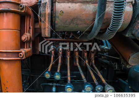 Excavator part repaire in fix shop old engine Excavator part repaire in fix shop old engine 106635395
