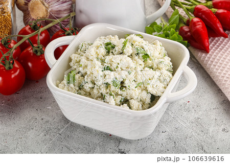 Curd cheese with green herbs 106639616