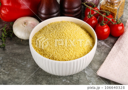 Raw dry wheat couscous grain Raw dry wheat couscous grain 106640328