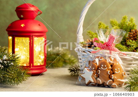 Christmas gingerbread cookies and garland lights Christmas gingerbread cookies and garland lights 106640903