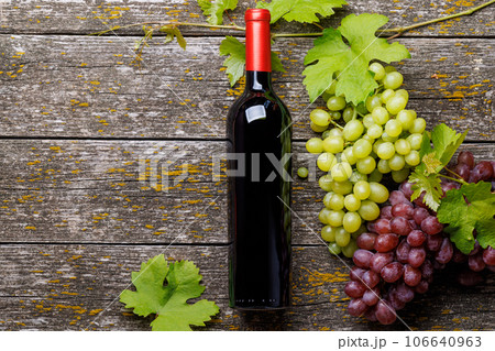 Wine bottle and grape 106640963