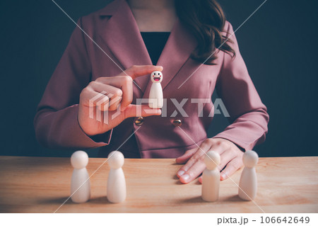 Human resources officer looking for leader and CEO concept, HR manager hand or Employer chooses takes in hand employee. Leader stands out from crowd. Looking for good worker. HRM, HRD 106642649