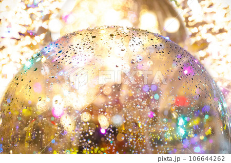 Christmas ball with Xmas and New Year decoration bokeh light, Christmas background 106644262